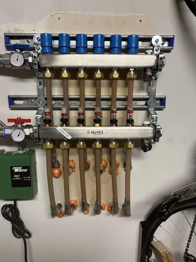 Plumber performing Water Heater Repair at a residential property in Newbury